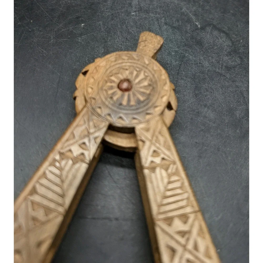 Vintage Hand Carved Wooden Nutcracker Geometric Folk Art Sunburst Design Brown